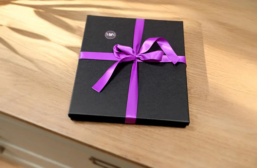 Elegant pet portrait gift wrapping with tissue paper, a custom gift box, and ribbon, perfect for a memorable presentation