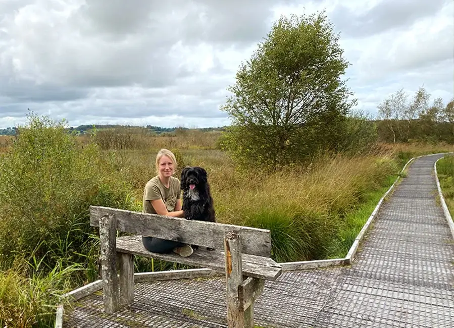 Melanie and Lily on the boardwalk at Tregaron Melanie Phillips and Lily the Tibetan Terrier walking on the Tregaron wildlife boardwalk.