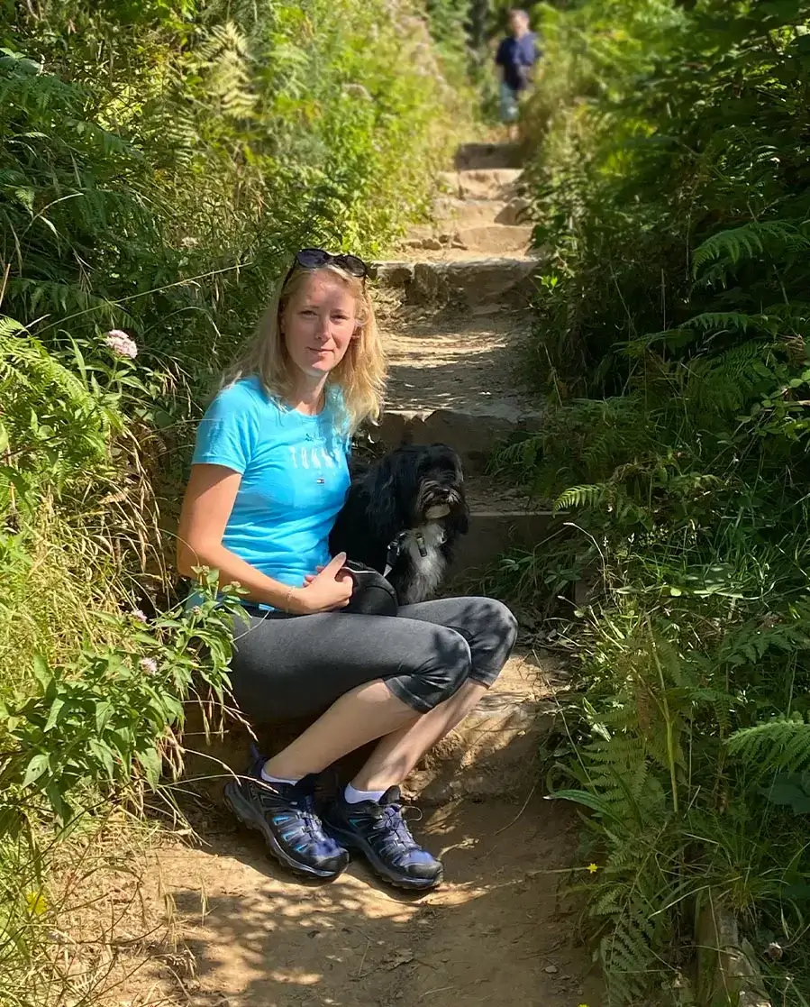 Melanie and Lily at Bosherston Lakes Melanie Phillips and Lily the Tibetan Terrier walking along a footpath near Bosherston Lakes in Pembrokeshire.